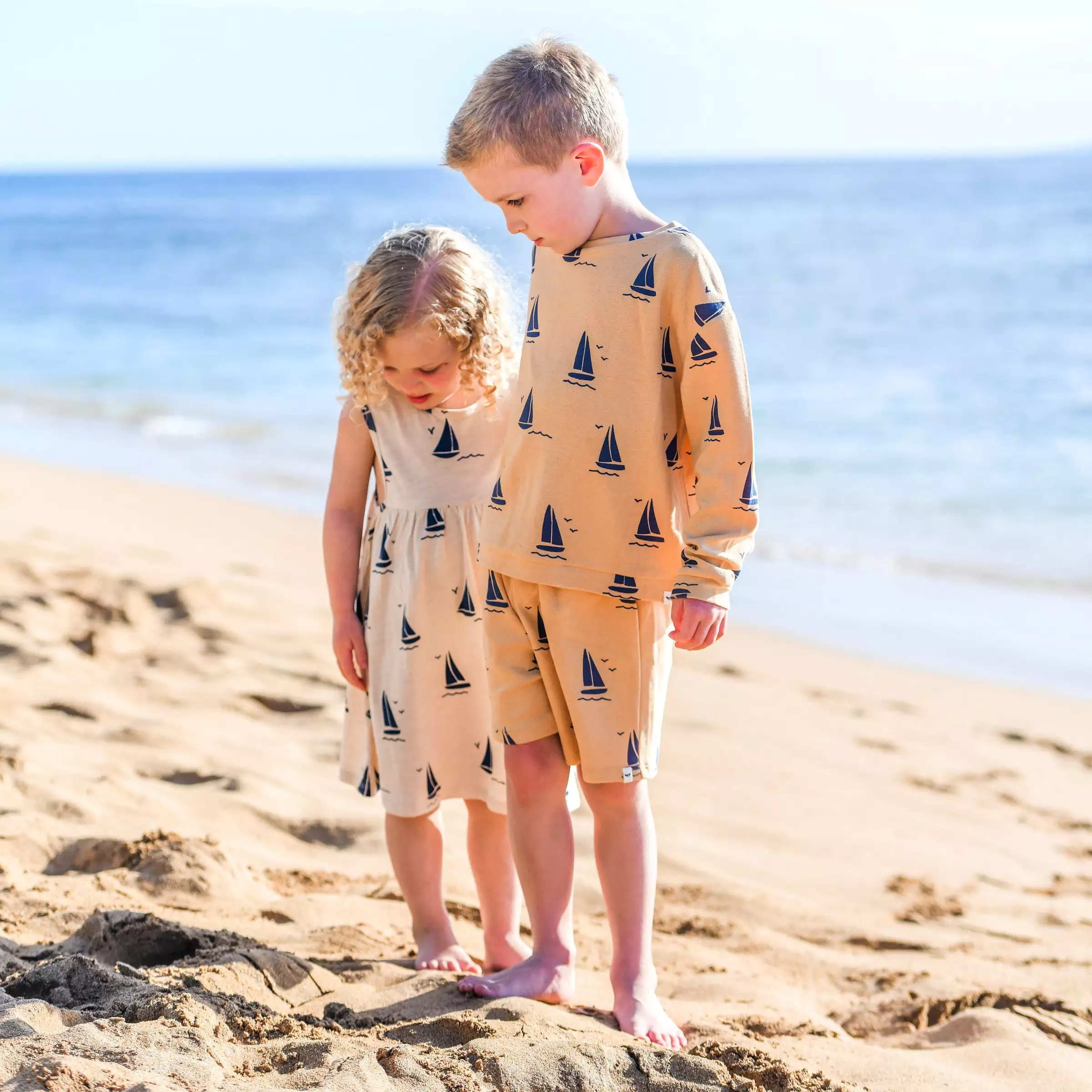 Baby track shorts boys sailboat oatmilk.