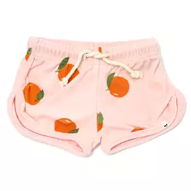 Cotton drawstring track shorts with oranges print in pale pink.