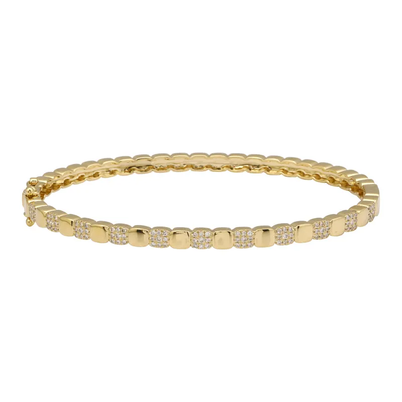 Gold bracelet with ash diamond square pattern.