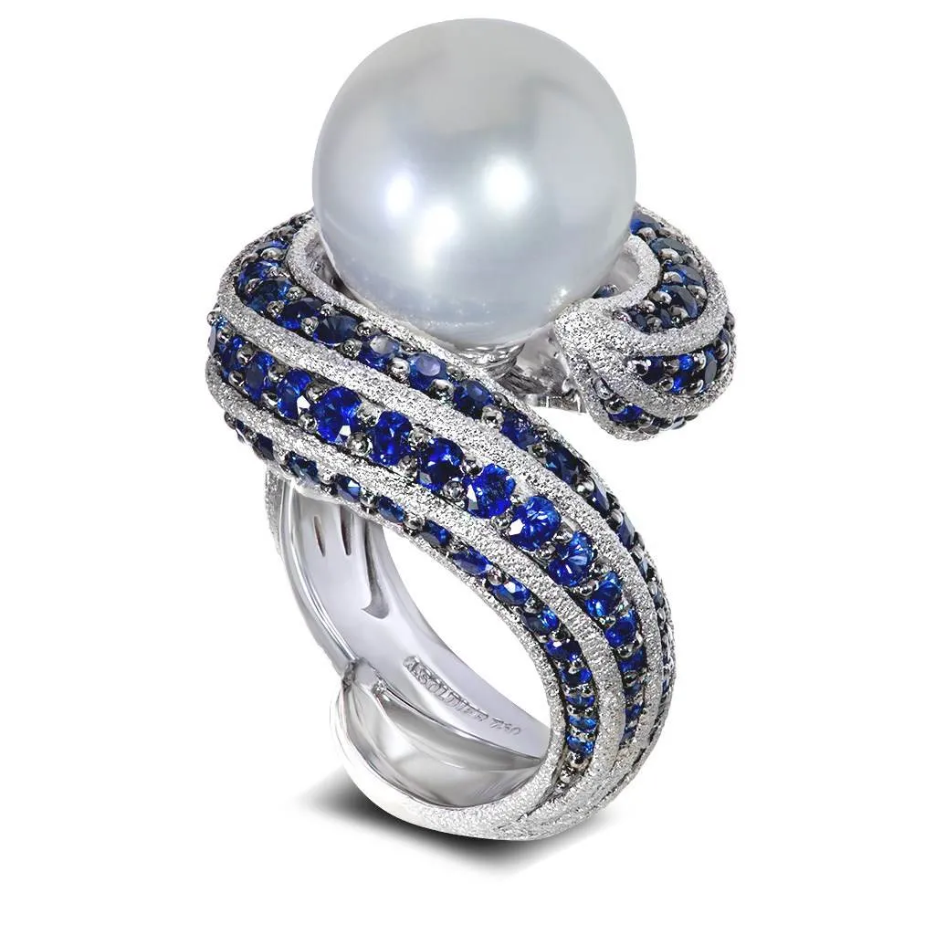 Gold pearl sapphire twist ring