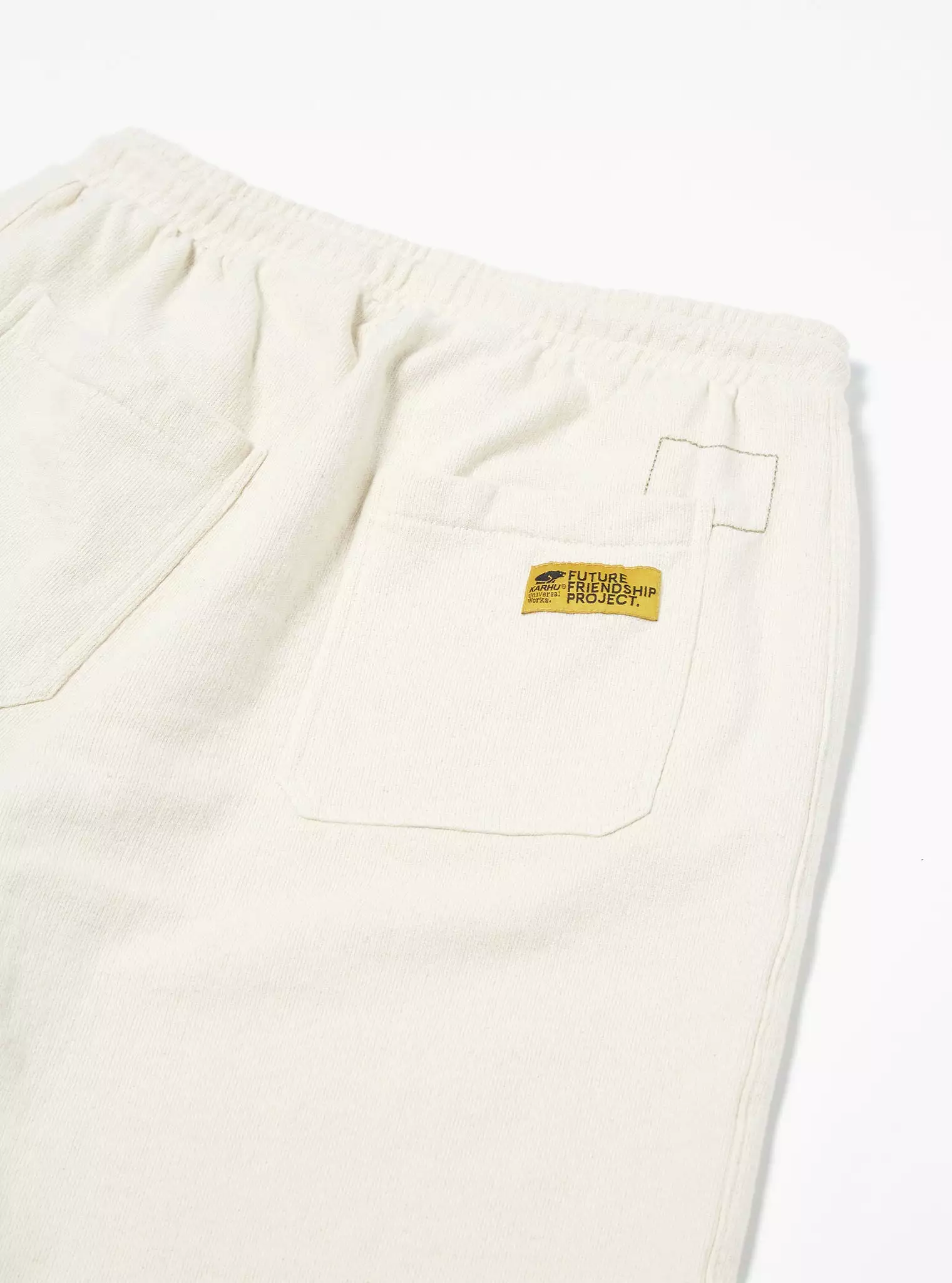 KARHU x UNIVERSAL WORKS Track Shorts in Ecru